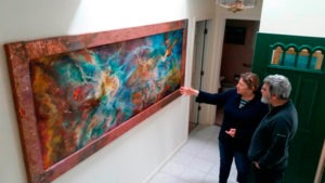 Jill Nichols with her painting "Phi" and the Director of the Vatican Observatory.